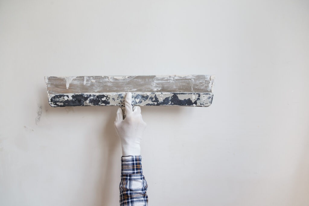 worker in white gloves performs plastering of the 2021 08 26 17 11 17 utc 1024x683 1